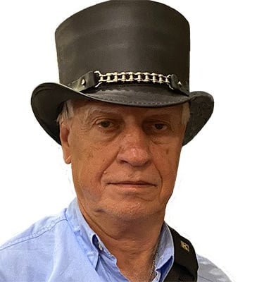 Photo of author Dan Dooley wearing a Steampunk style top hat.