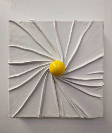 a yellow sphere in the middle of radiating plastered fabric