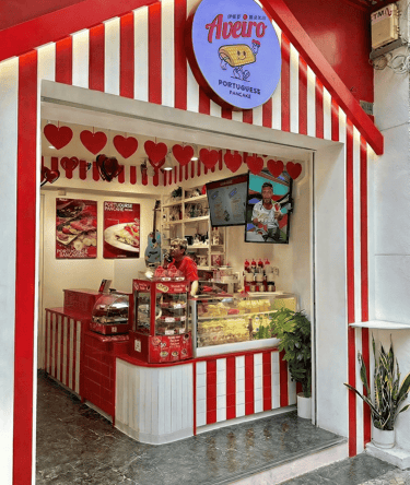 Aveiro Macau storefront with traditional red and white stripes on Rua dos Ervanários