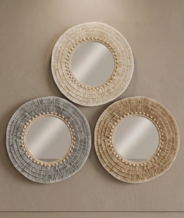 Three handcrafted cotton mirrors arranged as elegant wall art, featuring natural textures and warm b