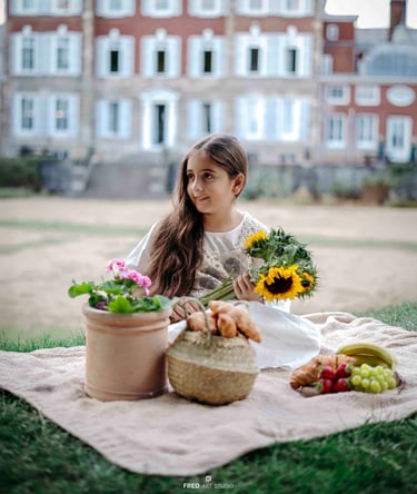 Little girl with sunflowers during picnic – Fred Art Studio kids photoshoot