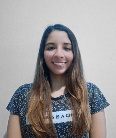 Professional psychologist smiling for a photo in formal wear