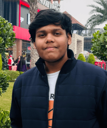 a man in a black jacket and a white shirt