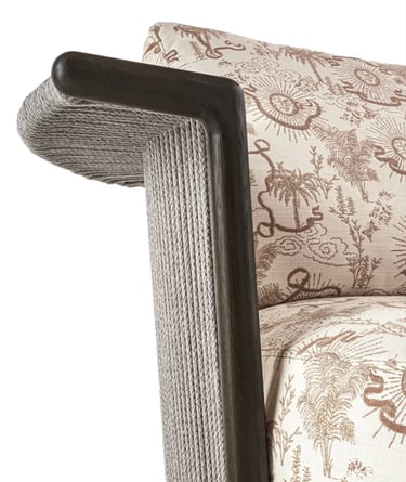 Comfortable outdoor seating with patterned cushions, natural textures and lounge chair design for re