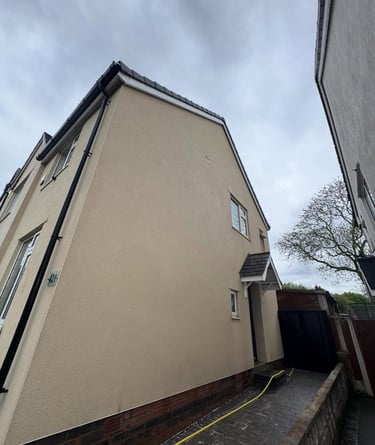 before and after photo of render cleaned by webster exterior in blackpool