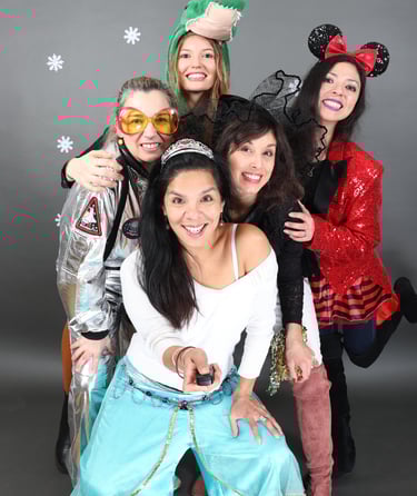 a group of people dressed in costumes for a photo