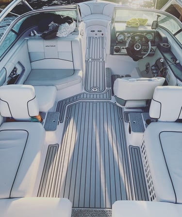 Boat interior upgraded with custom grey SeaDek flooring installed by Vital Marine in Ontario