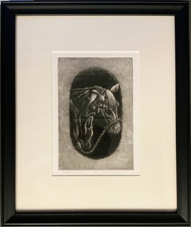 A mesotint of an old man and his horse in a black frame.