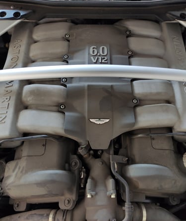 an Enlab car engine with a number of engine parts on it