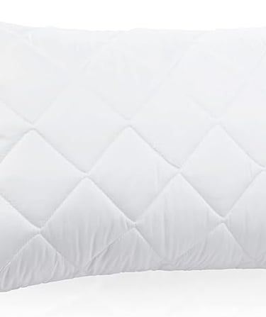 White quilted bed pillow with a diamond pattern fabric cover for comfortable sleeping.