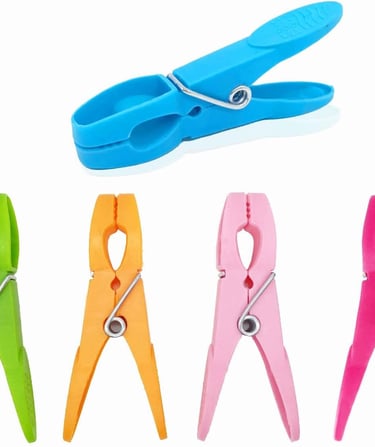 a variety of clothes pegs with a clipping of clothes