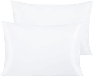 a pair of white pillows with a white pillow