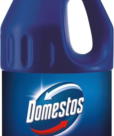 a bottle of cleaner with a blue bottle of cleaner