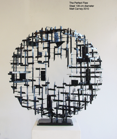 a steel cross-hatched  circle sculpture  