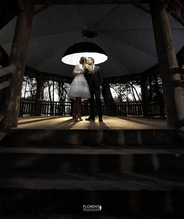 fantastic wedding photographer florent lille saint omer paris couple standing under a white umbrella