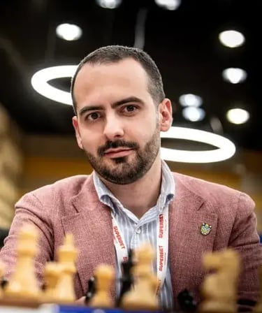 Chess trainer Vlad Ghita, captured by David Llada at EICC 2025 in Eforie Nord, Romania