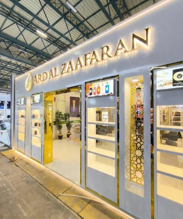 an elegant bespoke cosmetic sector exhibition stand with golden details stand 