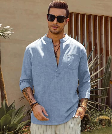 a sky blue shirt and white pants