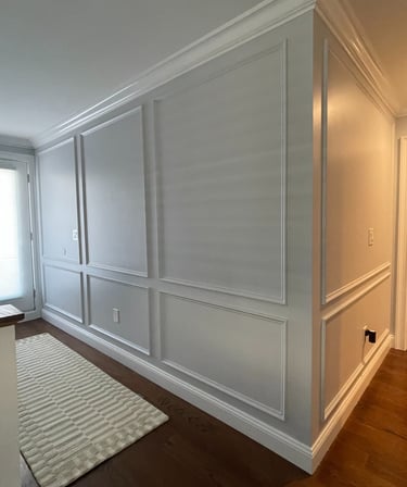 Architectural wall panels bring depth and balance to stairways, foyers, and entry walls.