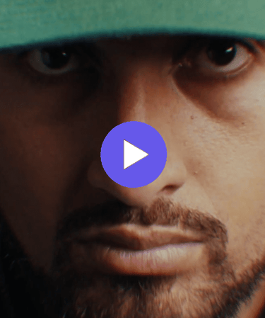 a man with a hat and a hat on