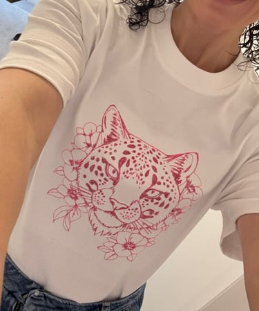 beautiful cheetah big cat thread artwork in pink on a white tshirt