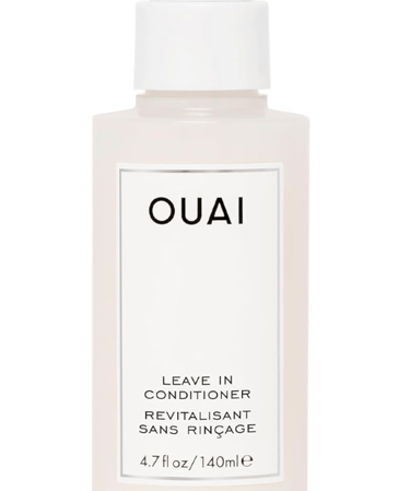 OUAI Leave In Conditioner spray bottle for hair hydration and heat protection.
