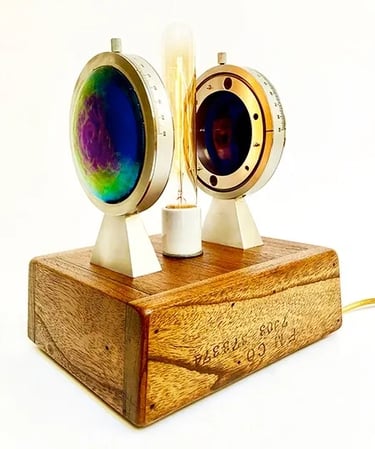 Custom light made from blown glass, foundry mold and gauges.