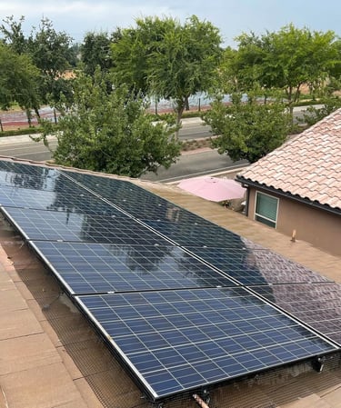 Freshly cleaned solar panels on a Fresno home by Spartan Home Services
