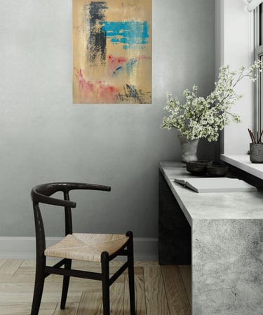 Ochre painting with black and azure marks in room with designer chair