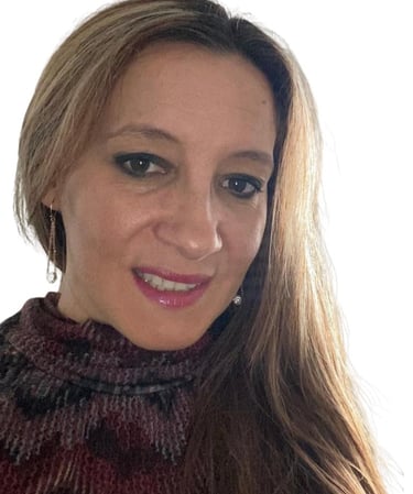 a woman with long hair and a red sweater