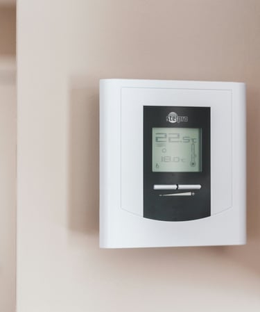 A programmable thermostat which is helpful ijn lowering utility bills.