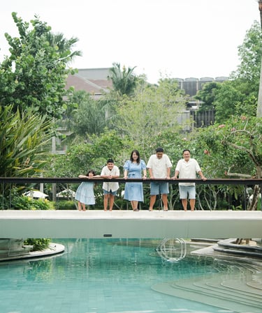 tropical poolside atmosphere at Movenpick Jimbaran Bali ideal for relaxed family photography sessions