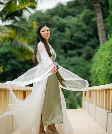Elegant bride walking on terrace at Amankila Karangasem East Bali