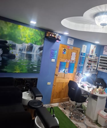 a salon and beauty salon with a large painting on the wall