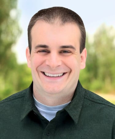 a man with a green shirt and a white shirt