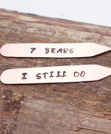 Copper collar stiffeners personalised with a 7th anniversary message