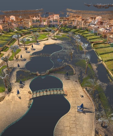 Aerial 3D model of a luxury resort complex featuring villas, green lawns, and a central water park.