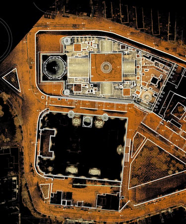 Aerial lidar scan map showing an orange point cloud architectural site plan and building layouts.