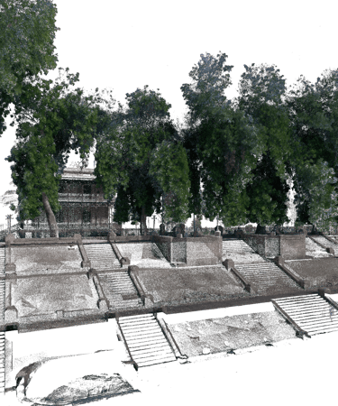 Digital 3D point cloud scan of stone riverbank steps and green trees in a park.
