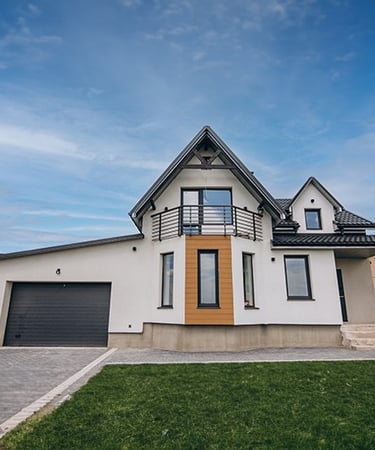 a house with a garage and garage door