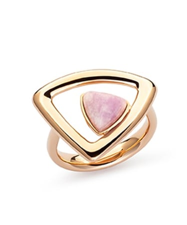 a pink and gold ring with a triangle shaped pink stone