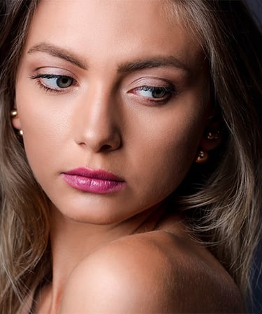 a woman with a pink lipstick and a pink lip