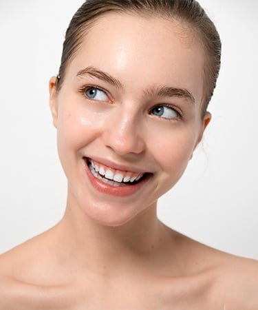 a woman with a smile on her face