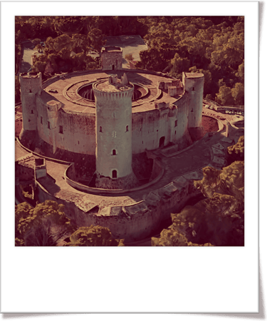 a castle like structure with a tower in the middle of it