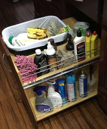 Under cabinet trash can with clean supplies racks