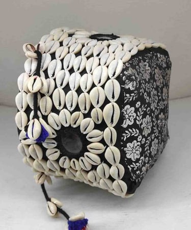 "Traditional bamboo basket covered in black textile with shell and artificial flower-Export-ready"
