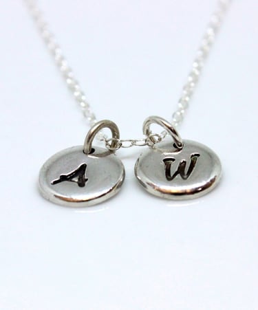 Personalised Jewellery. Silver jewellery with your words, initials & names stamped into the surface