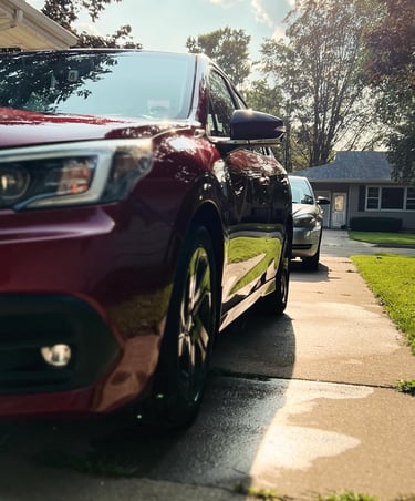 Professional mobile car wash removing grime and restoring a car’s shine