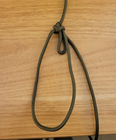 Bowline with a bight in green paracord