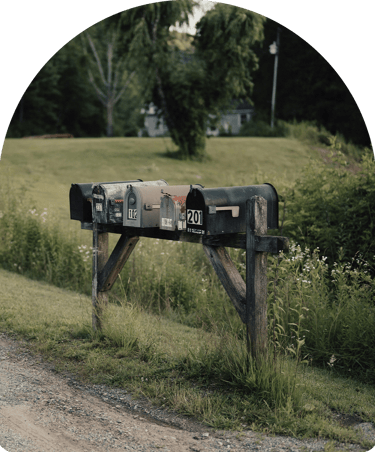 5 mailboxes along side each other 